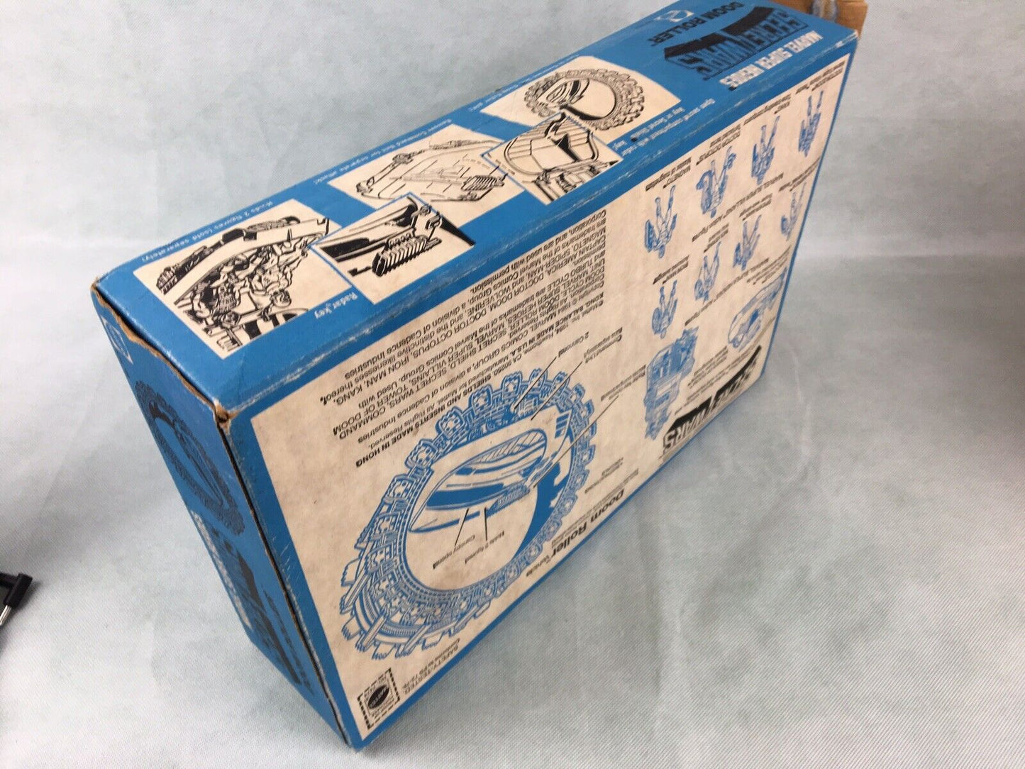 Marvel Secret Wars Doom Roller with box near complete and working