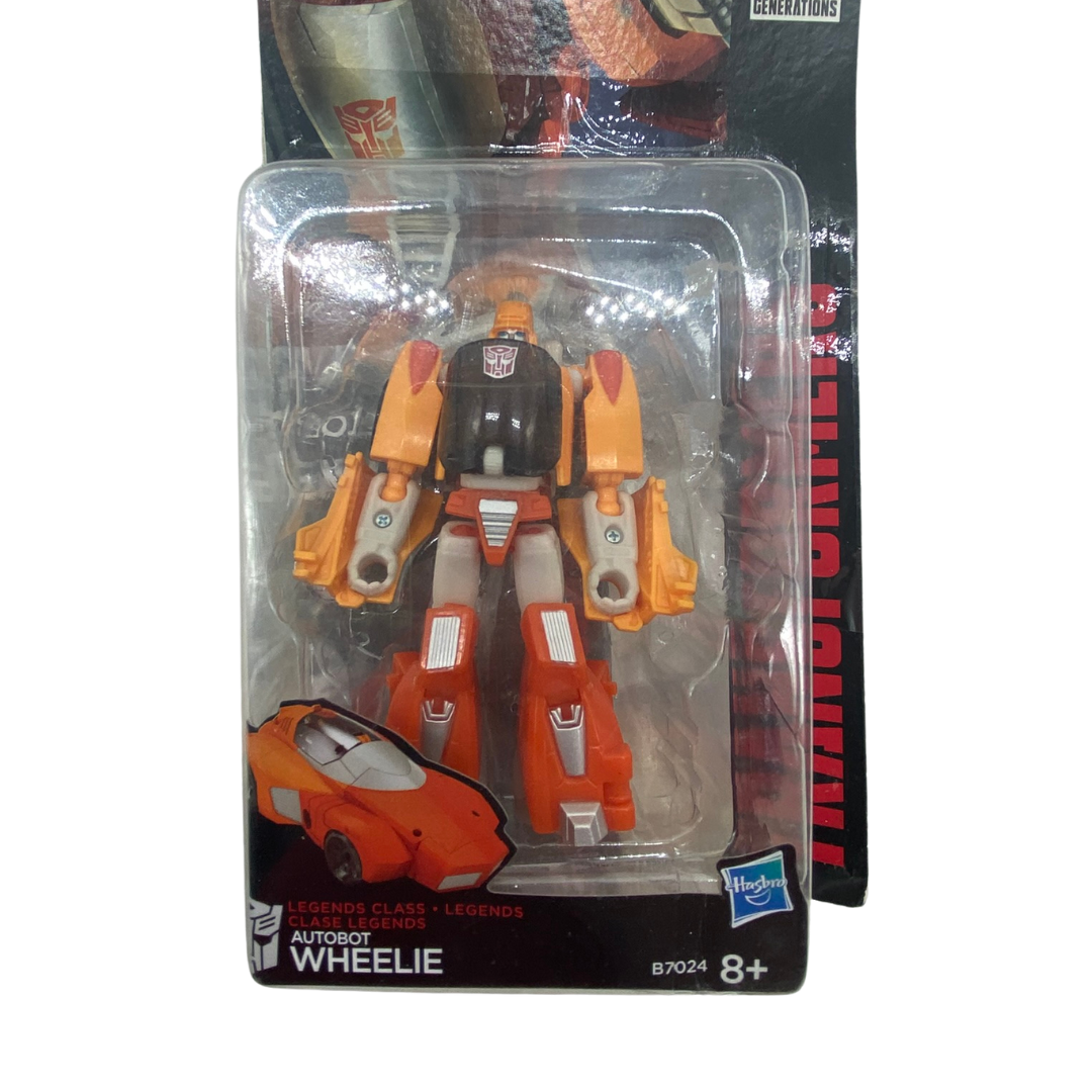 Transformers Titans Return Wheelie in opened packaging