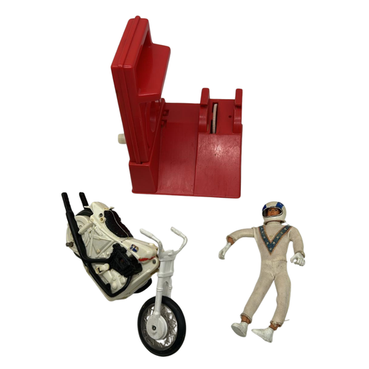 Evel Knievel figure, helmet, dirt bike and gyro winder stand / energiser 467
