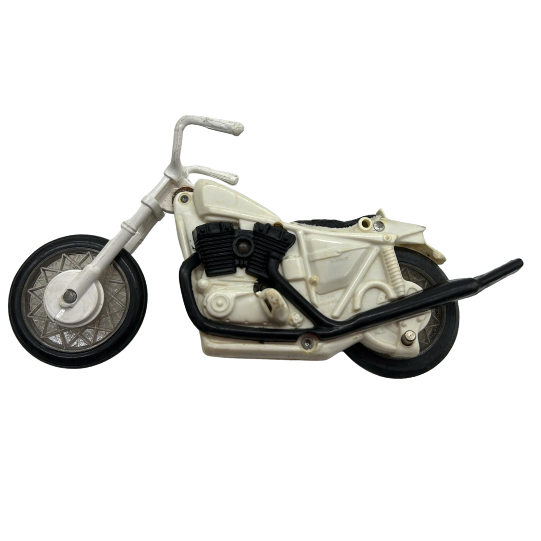 Evel Knievel figure, helmet, dirt bike and gyro winder stand / energiser 467