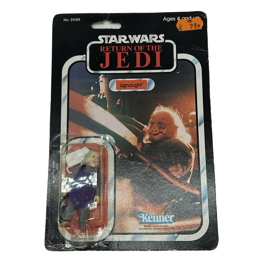 Vintage Star Wars Ugnaught figure on opened card ROTJ cardback & clear bubble