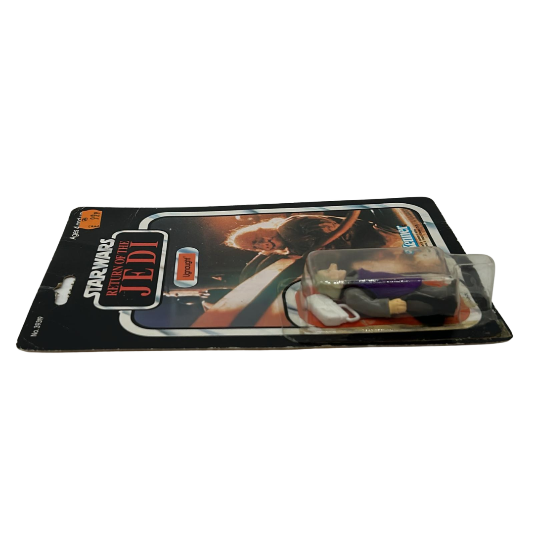 Vintage Star Wars Ugnaught figure on opened card ROTJ cardback & clear bubble