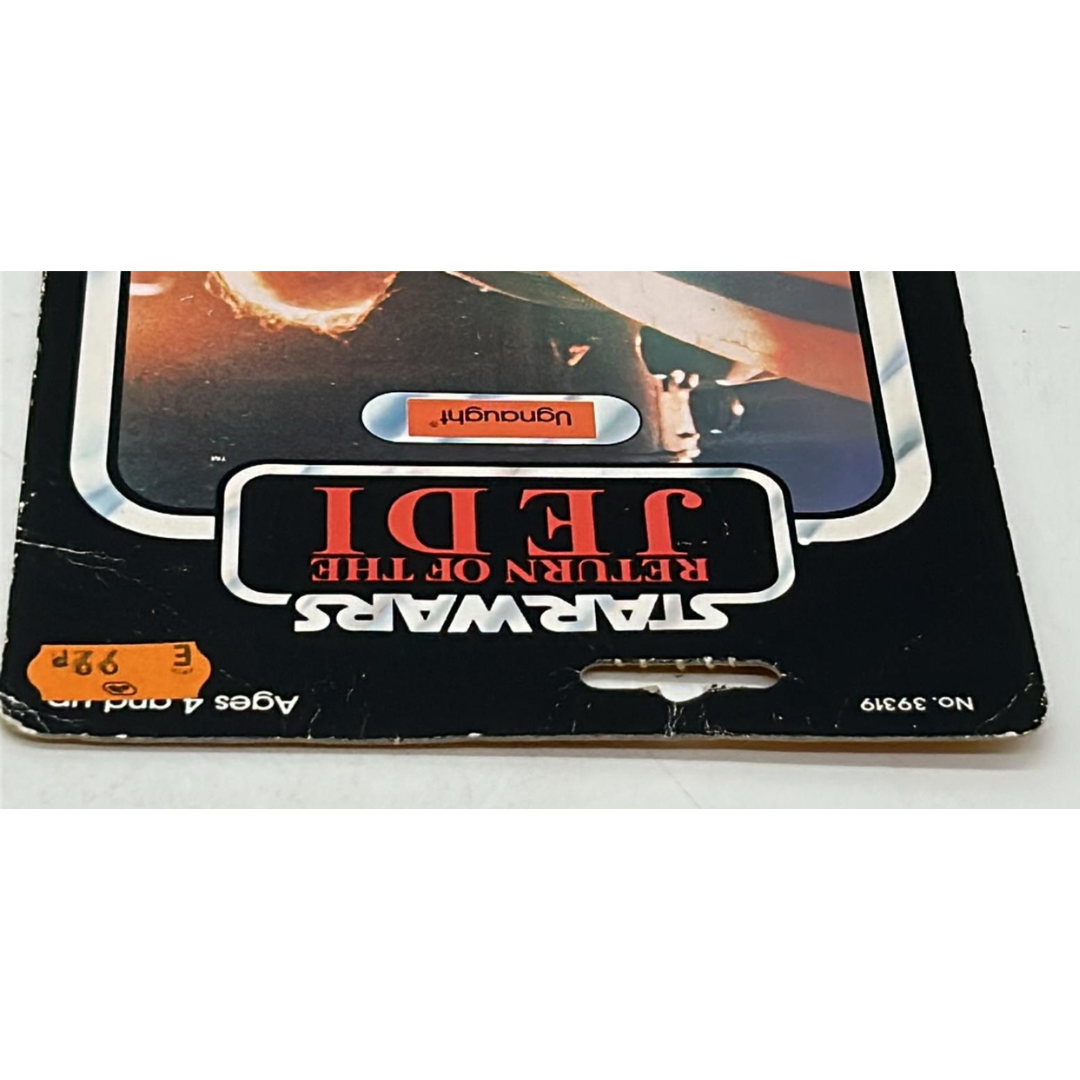 Vintage Star Wars Ugnaught figure on opened card ROTJ cardback & clear bubble