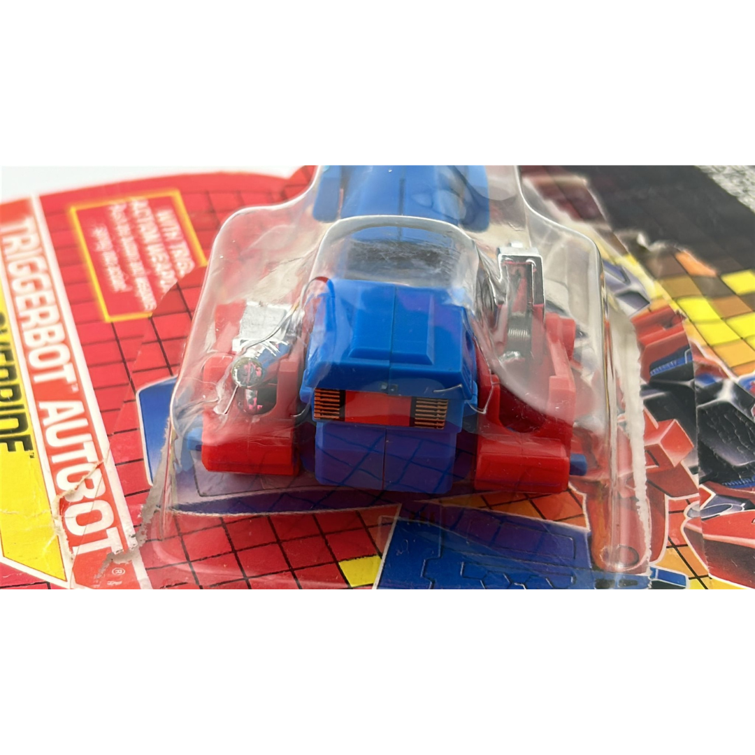 Transformers G1 Override Triggerbot Autobot with opened card and bubble