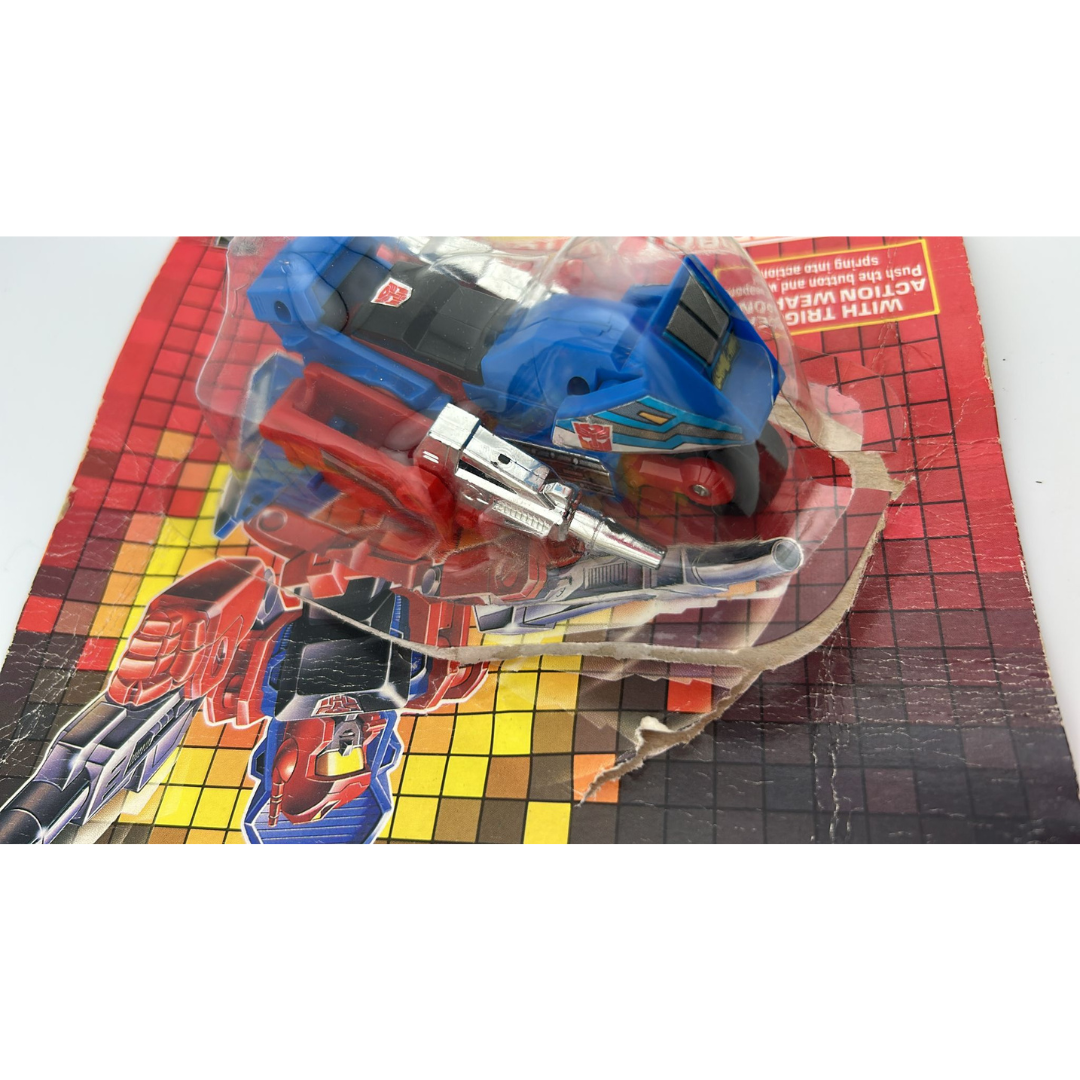 Transformers G1 Override Triggerbot Autobot with opened card and bubble