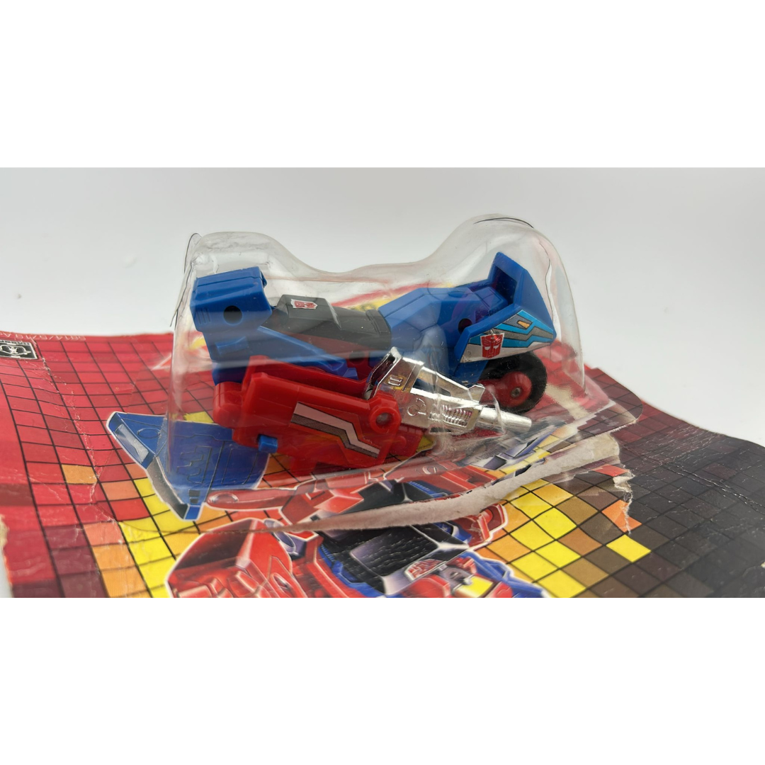 Transformers G1 Override Triggerbot Autobot with opened card and bubble