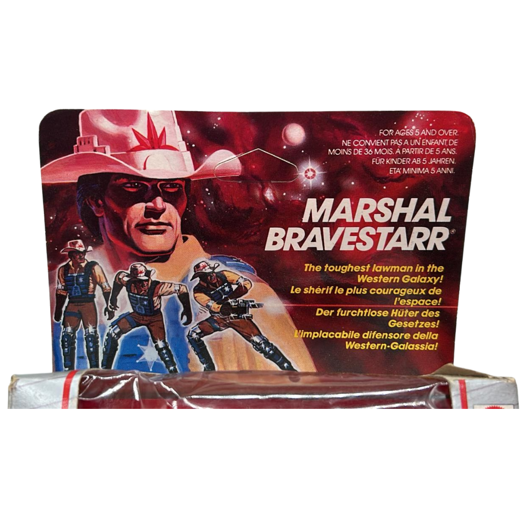 Bravestarr complete figure in opened box with bubble by Mattel included badge