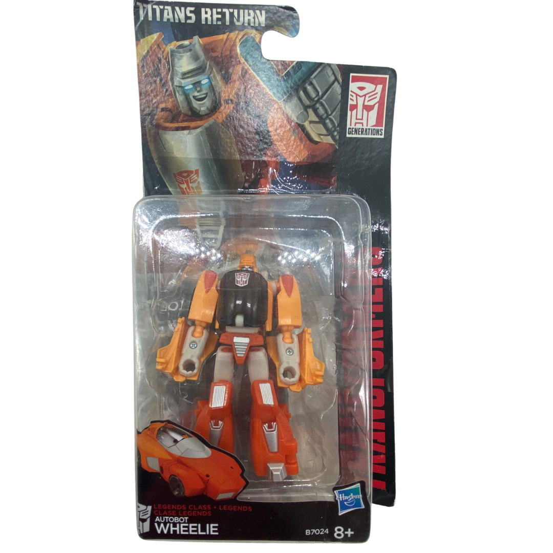 Transformers Titans Return Wheelie in opened packaging
