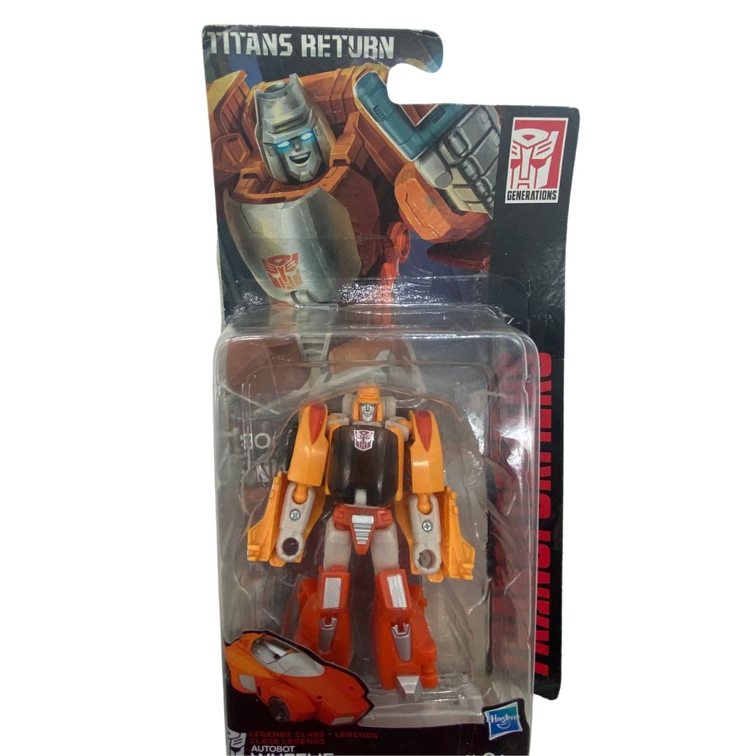 Transformers Titans Return Wheelie in opened packaging
