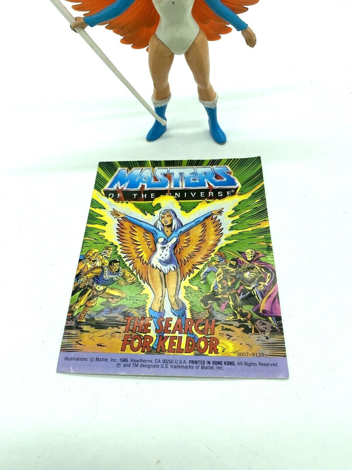 He-Man Sorceress figure complete with weapon and comic